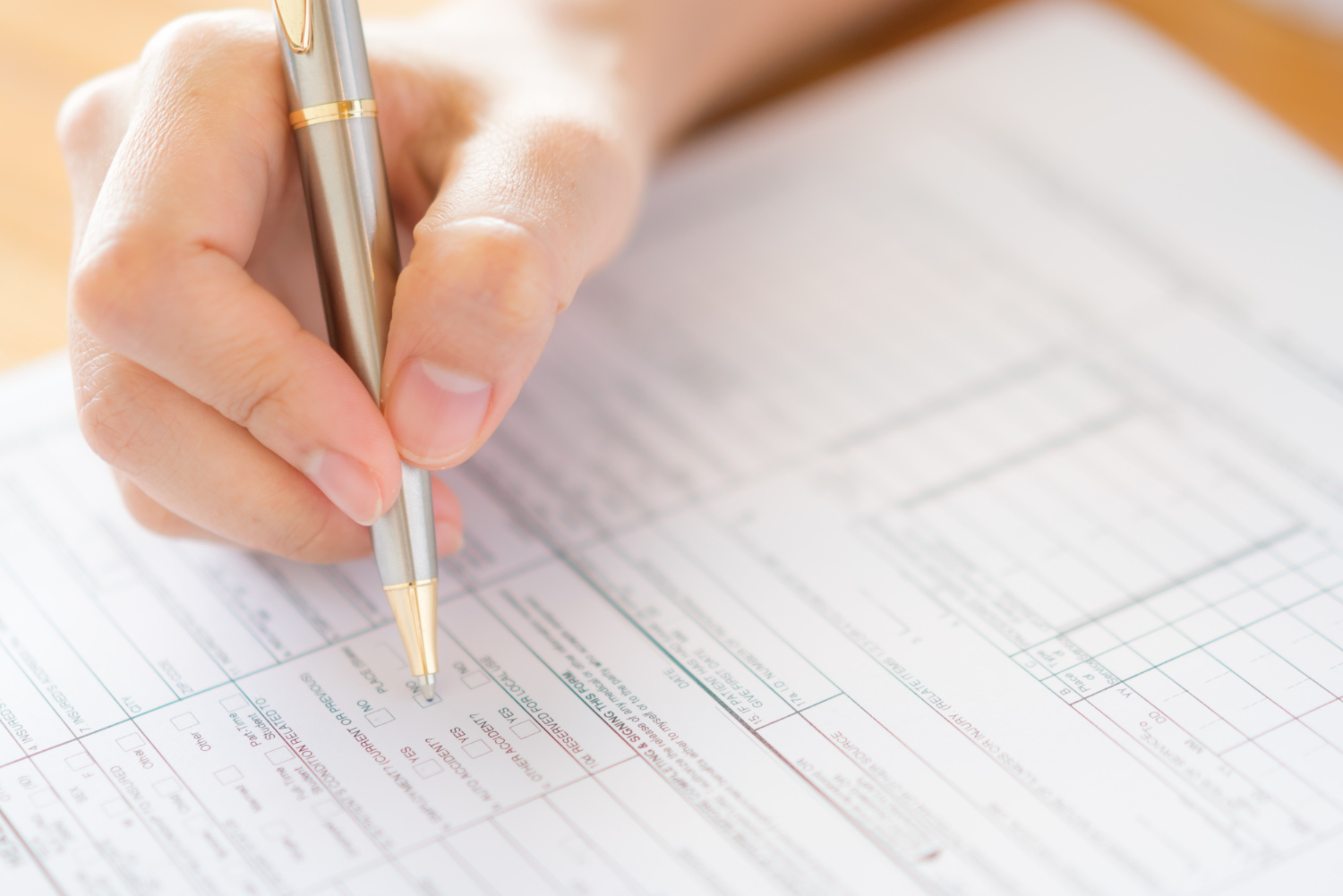 A spiritual still life with tarot cards, herbs, and crystals on a dark surface for meditation.